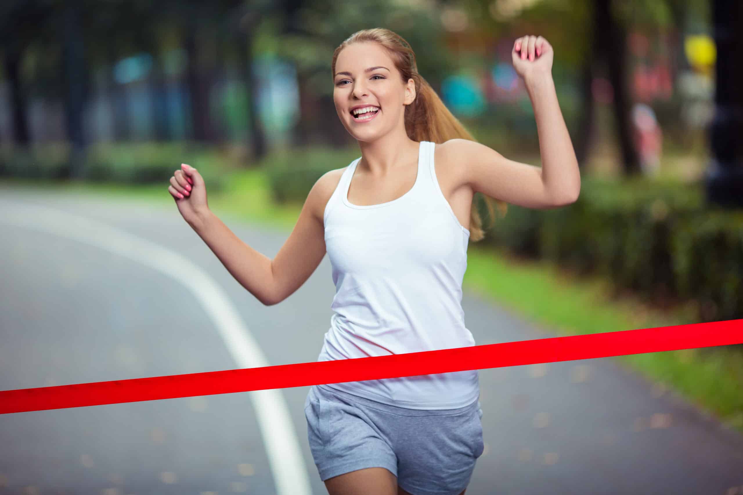 female runner at finish line