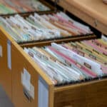 open file cabinet drawers filled with files