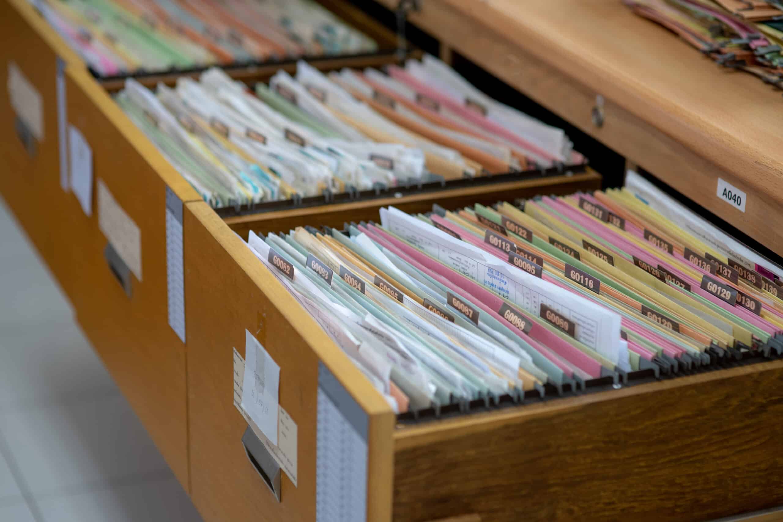 open file cabinet drawers filled with files